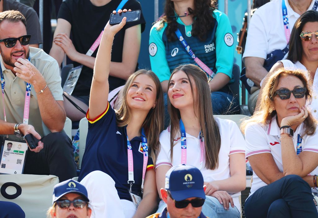 Infanta Sofi­a of Spain and Leonor, Princess of Asturias take a selfie during day three of the Olympic Games Paris 2024