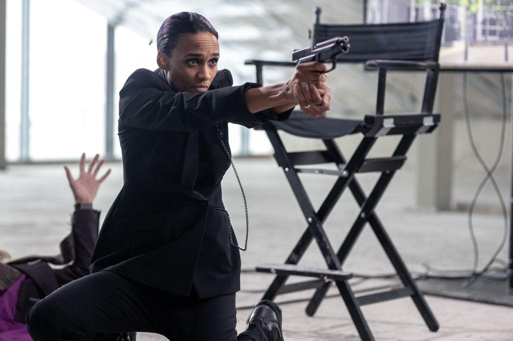 woman holding gun