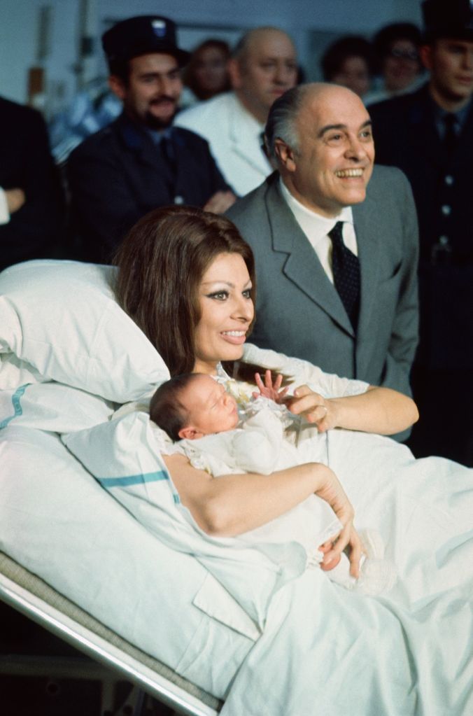 Sophia Loren and Carlo Ponti appear in public with their baby Carlo Ponti Jr 