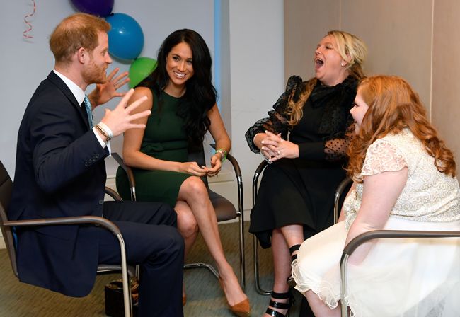the duke and duchess of sussex talk with milky sutherland and her mother angela 