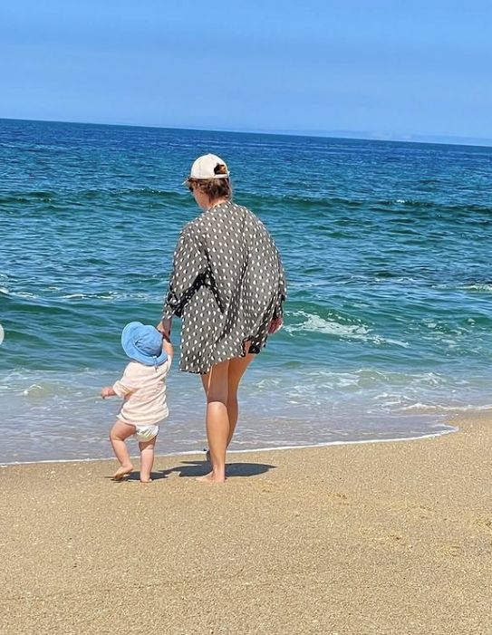 Princess Eugenie and son Ernest walking towards the sea