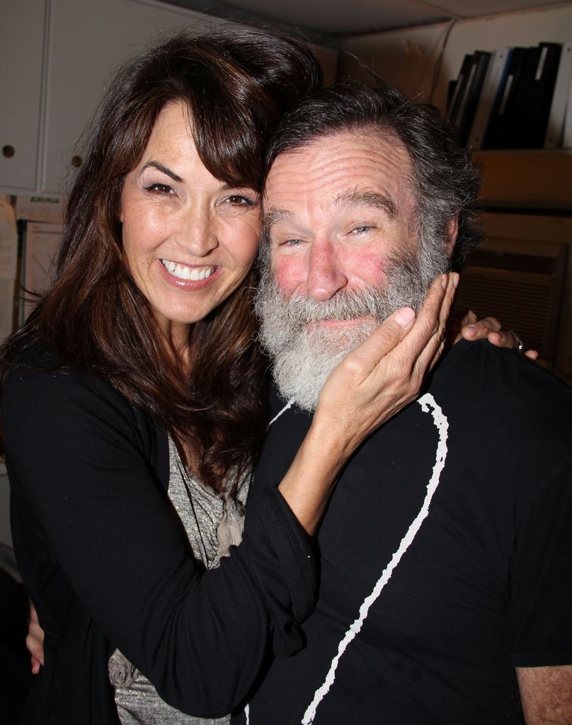 Susan Schneider and fiancee Robin Williams pose backstage at the hit play "Bengal Tiger at The Baghdad Zoo" on Broadway at The Richard Rogers Theater on June 15, 2011 in New York City.