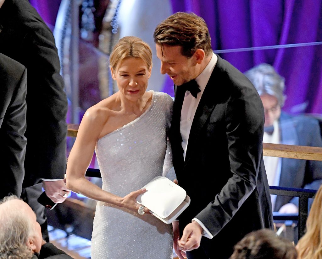 Renee Zellweger and Bradley Cooper meeting at the Oscar's