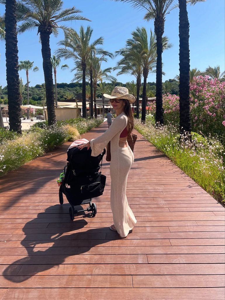 Michelle in crochet beach dress with palma in pram