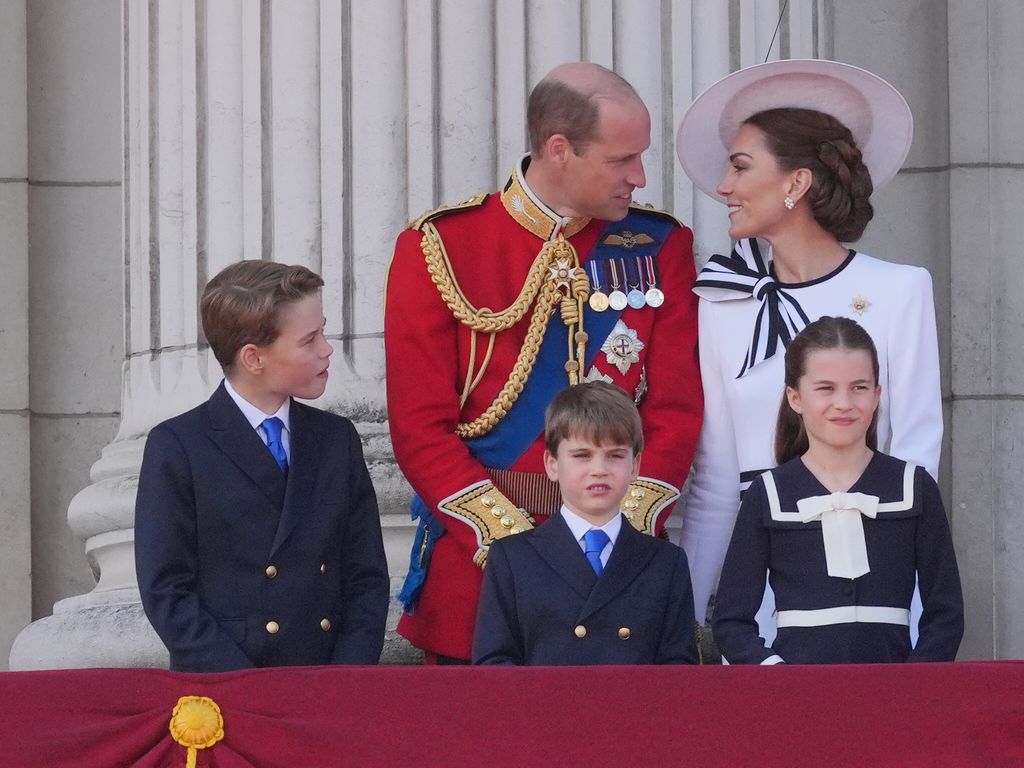 Prince George, the Prince of Wales, Prince Louis, the Princess of Wales and Princess Charlotte on the balcony of Buckingham Palace, London, to view the flypast following the Trooping the Colour ceremony
