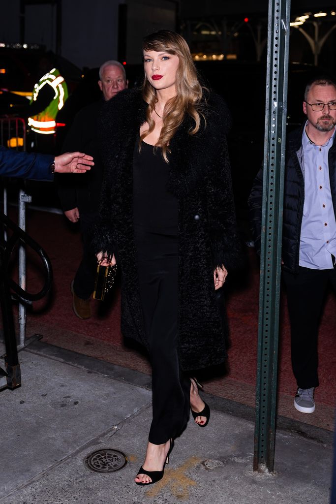 Taylor Swift is seen in Midtown in a stunning black ensemble