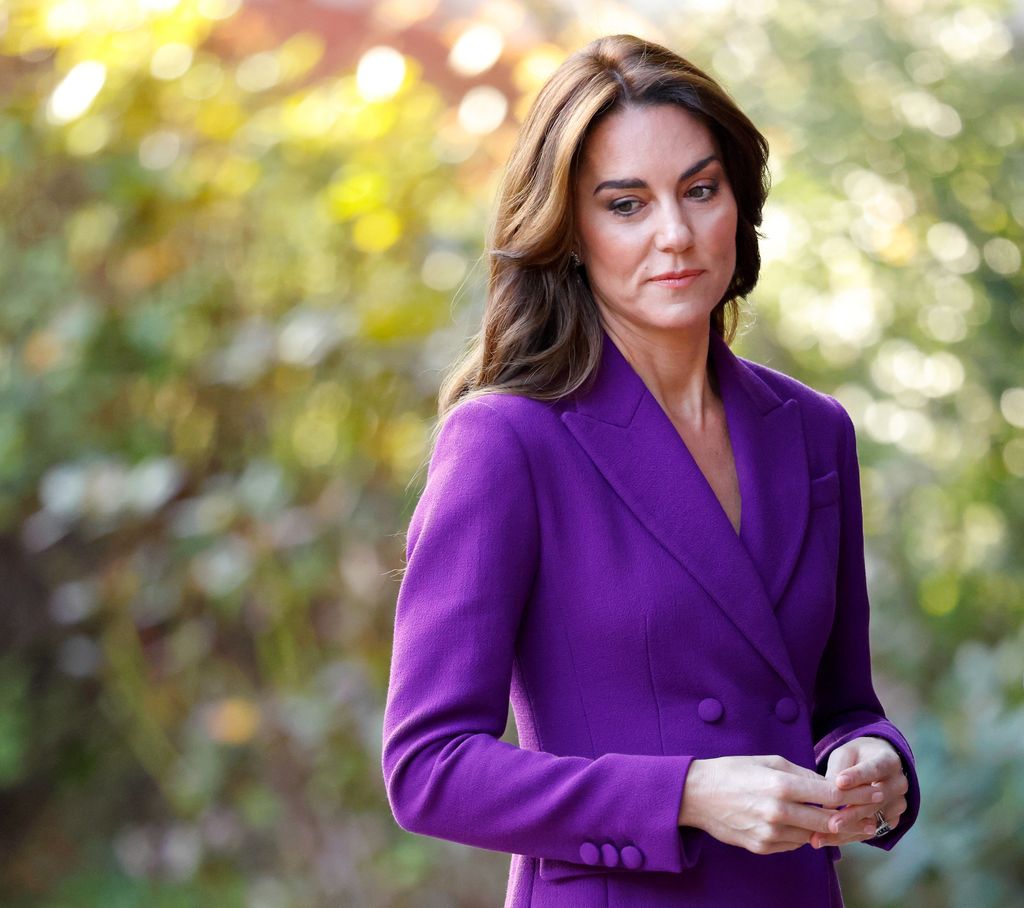 Kate Middleton in a purple coat