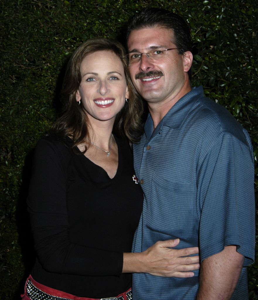Marlee hugging her husband 