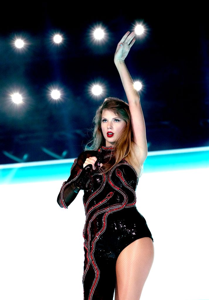 Taylor wears a glittering snake bodysuit for the opening night of Taylor Swift | The Eras Tour