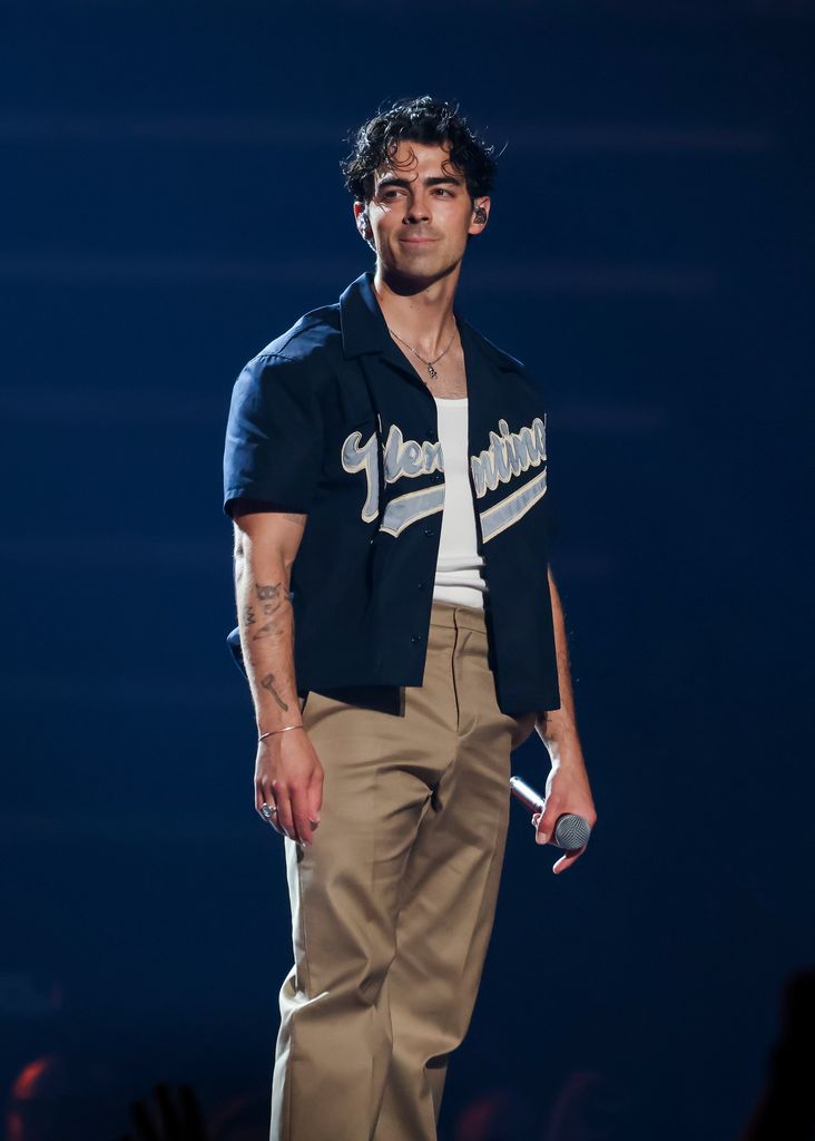 Joe Jonas performs onstage during Jonas Brothers âFive Albums, One Nightâ Tour at Little Caesars Arena on August 24, 2023 in Detroit, Michigan