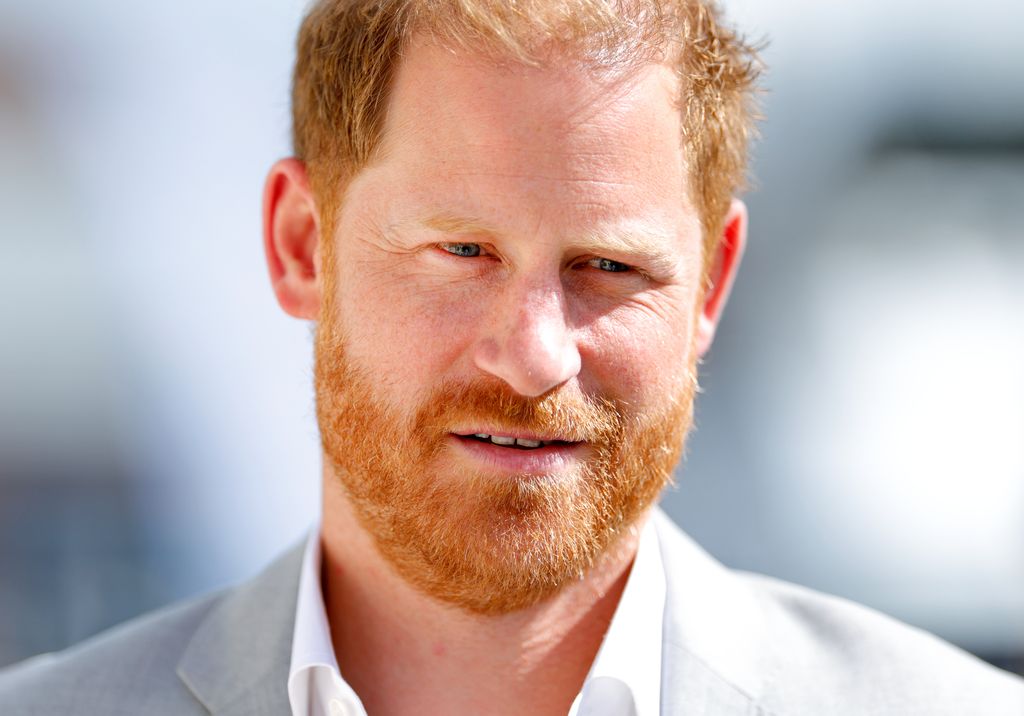 Prince Harry in grey suit, close-up