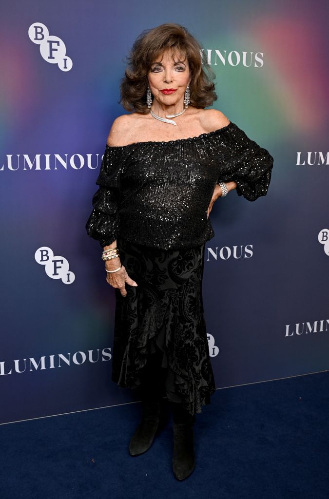 woman posing on red carpet at gala event