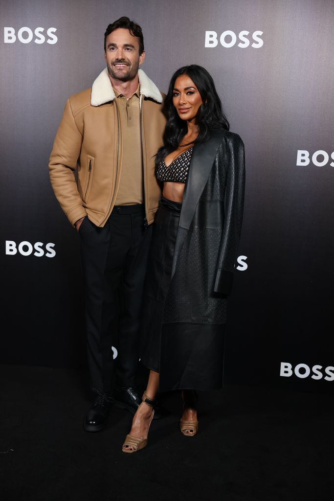Nicole Scherzinger and thom evans attend the Boss Fashion Show