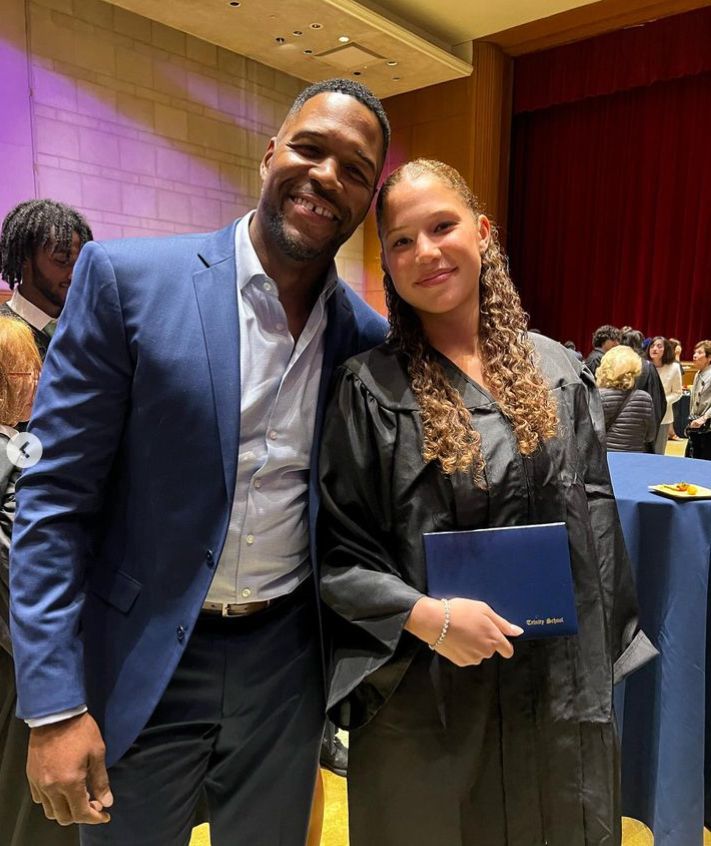 Michael Strahan and Sophia at a graduation ceremony