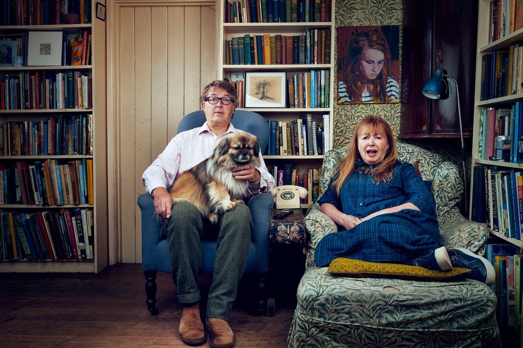Giles and Mary with their pet dog