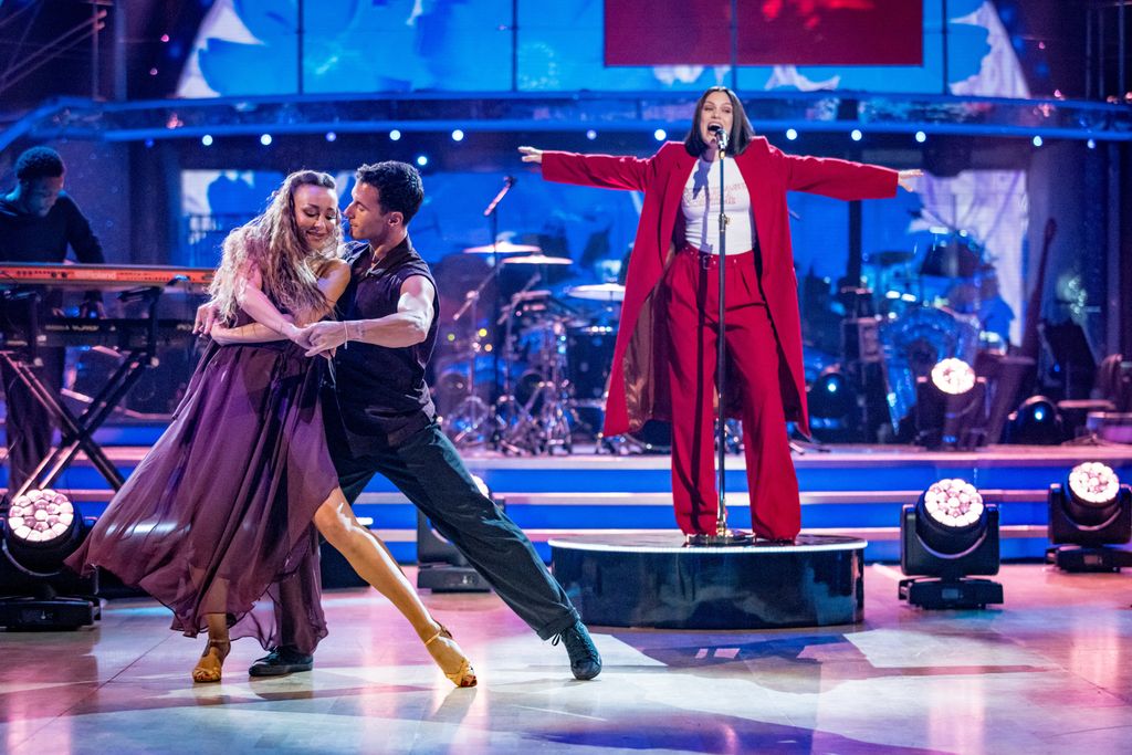 Gorka Marquez and Luba Mushtuk dancing while Jessie J performs