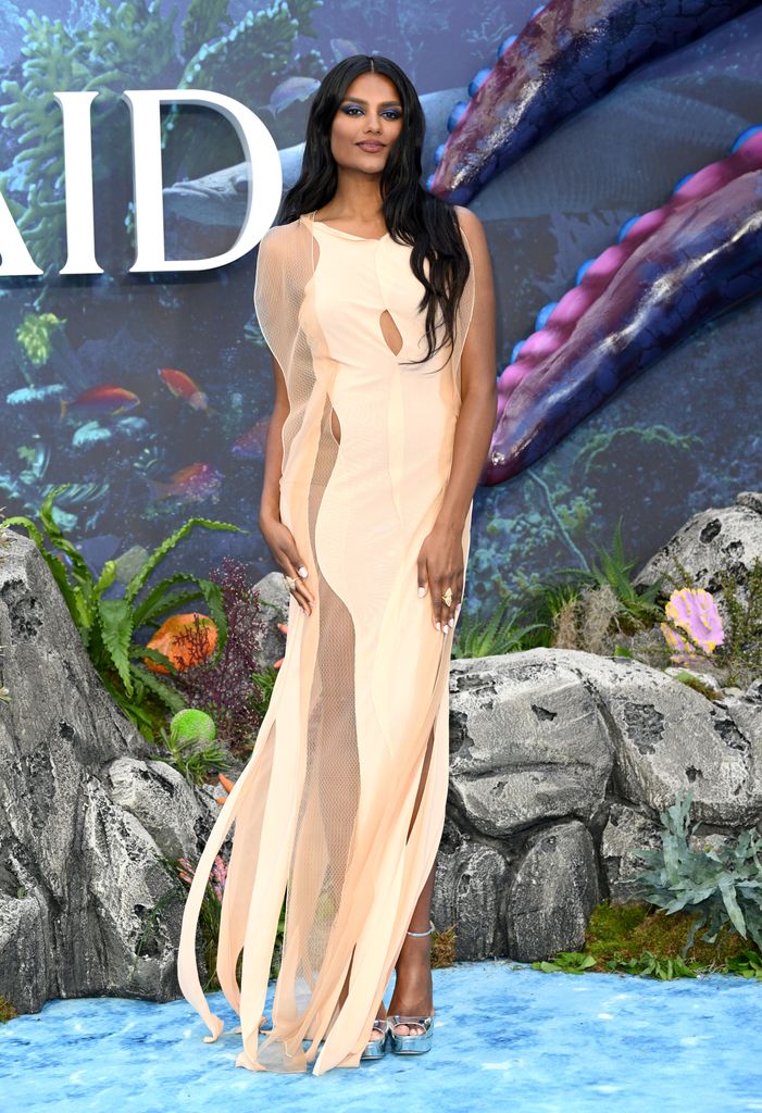 Simone Ashley exuded effortlessness in a pale peach sheer gown with a shredded hem 