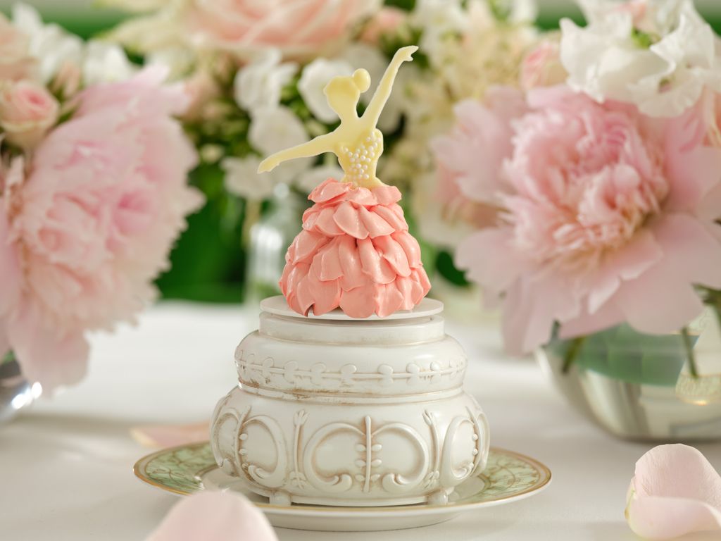 cake with chocolate ballerina on top