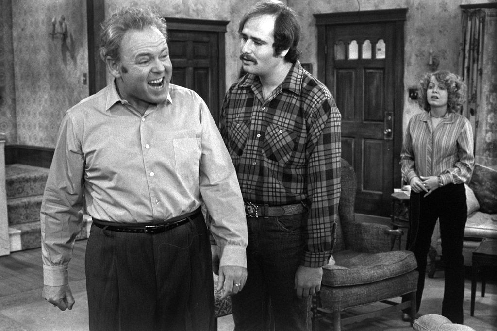 ALL IN THE FAMILY second episode, "Writing the President". Carroll O'Connor as Archie Bunker, Rob Reiner as Michael Stivic and Sally Struthers as Gloria Bunker Stivic. Original air-date January 19, 1971.