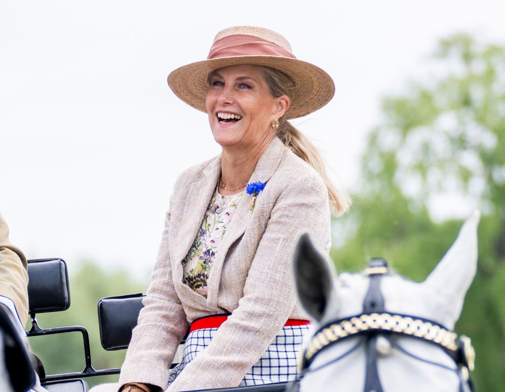 duchess sophie laughing while carriage driving 