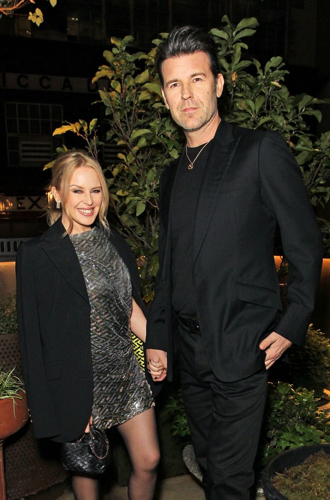 Kylie Minogue and Paul Solomons at a Versace event