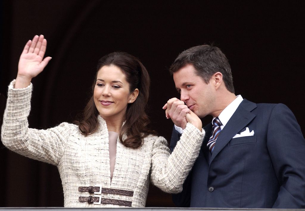 Frederik kisses Mary's hand on the balcony to celebrate their engagement
