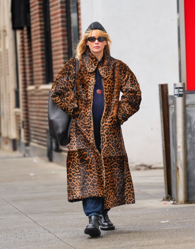 jennifer lawrence in striking leopard print coat