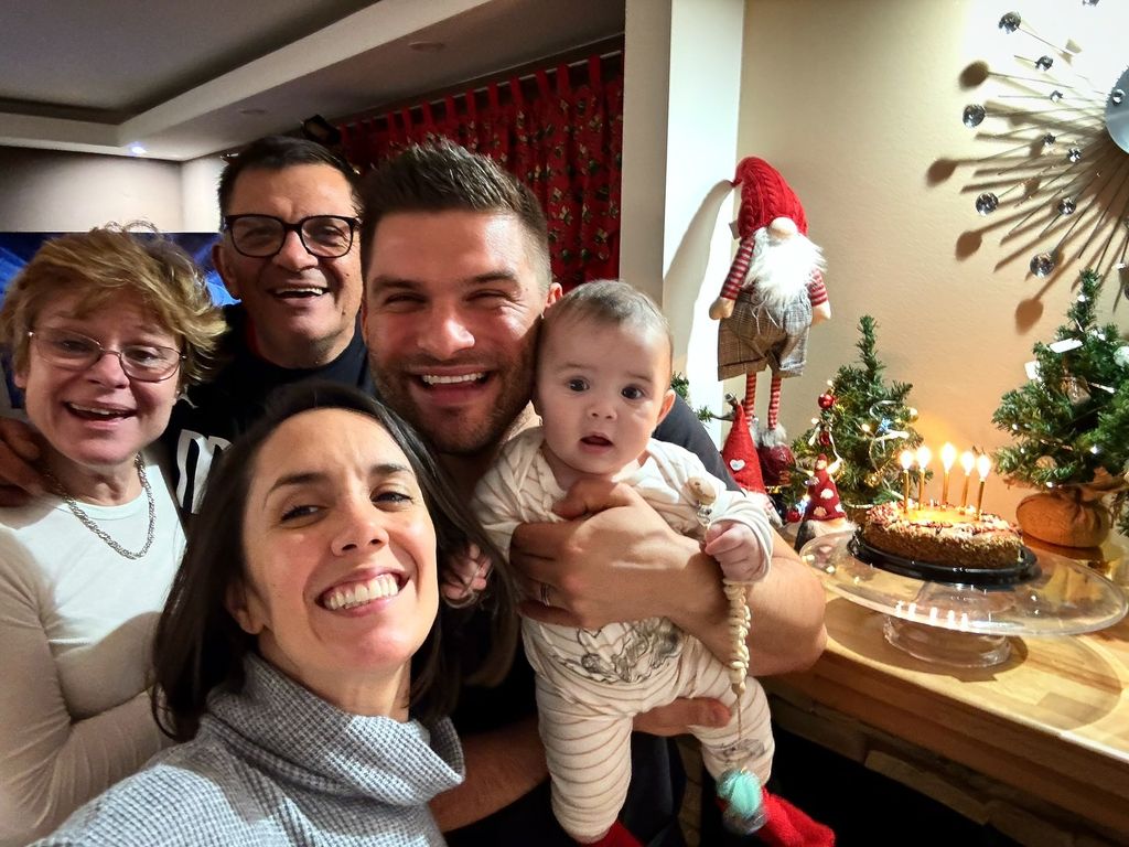 Janette Manrara and Aljaz Skorjanec family photo with baby Lyra and grandparents 