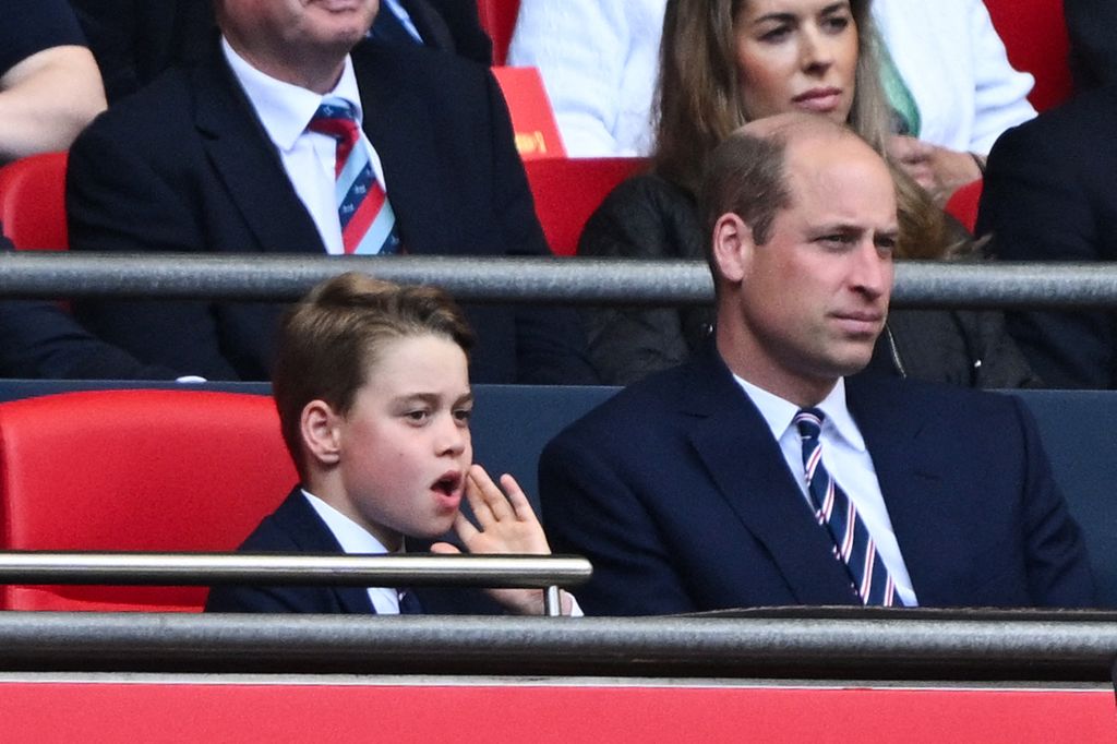Prince George of Wales and Britain's Prince William, Prince of Wales attend the English FA Cup final football match