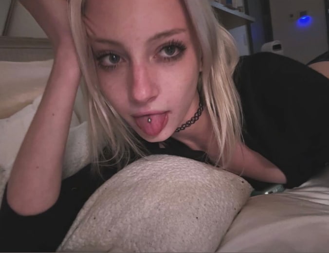  Kai Schreiber selfie in black top with tongue piercing 