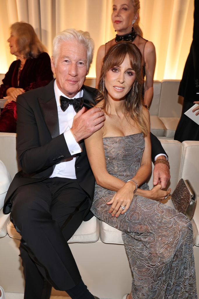 Richard and Alejandra  attend the Giorgio Armani fashion show