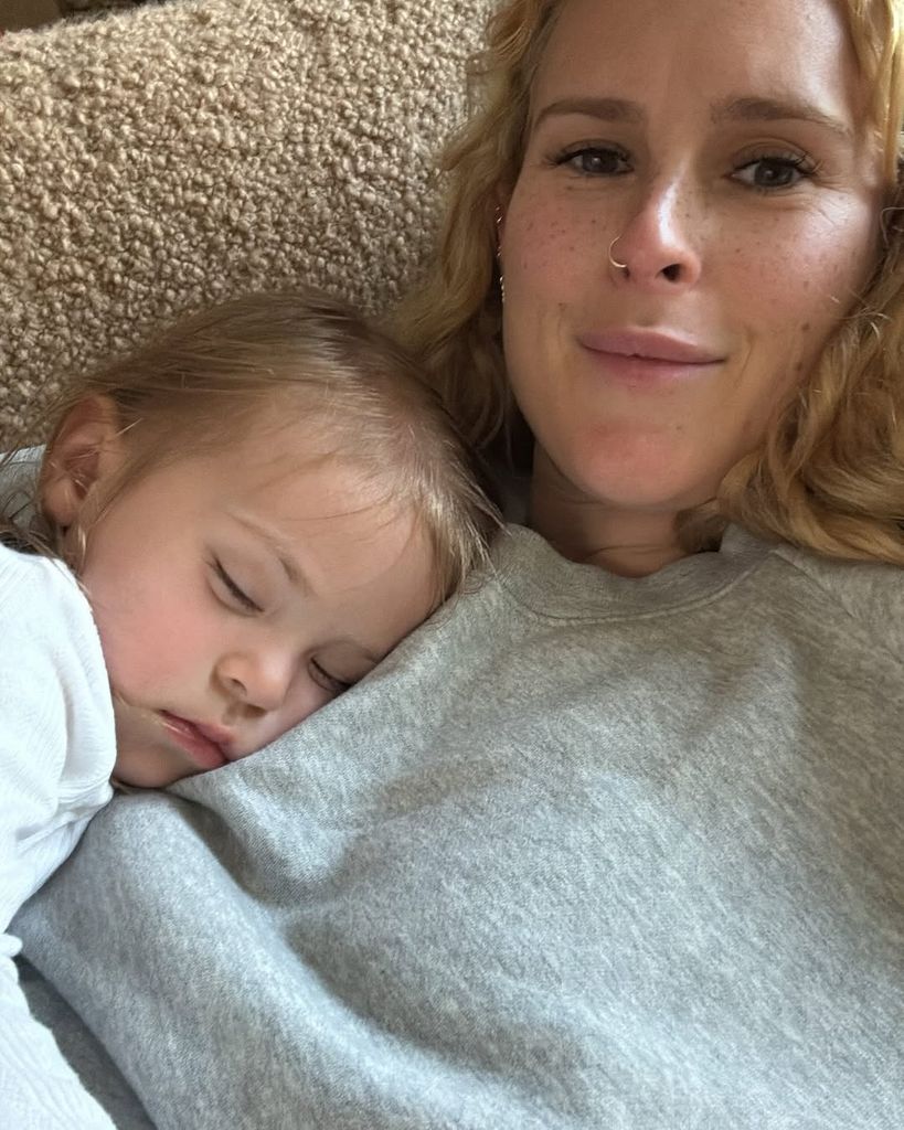 Rumer Willis with her daughter Lou sleeping