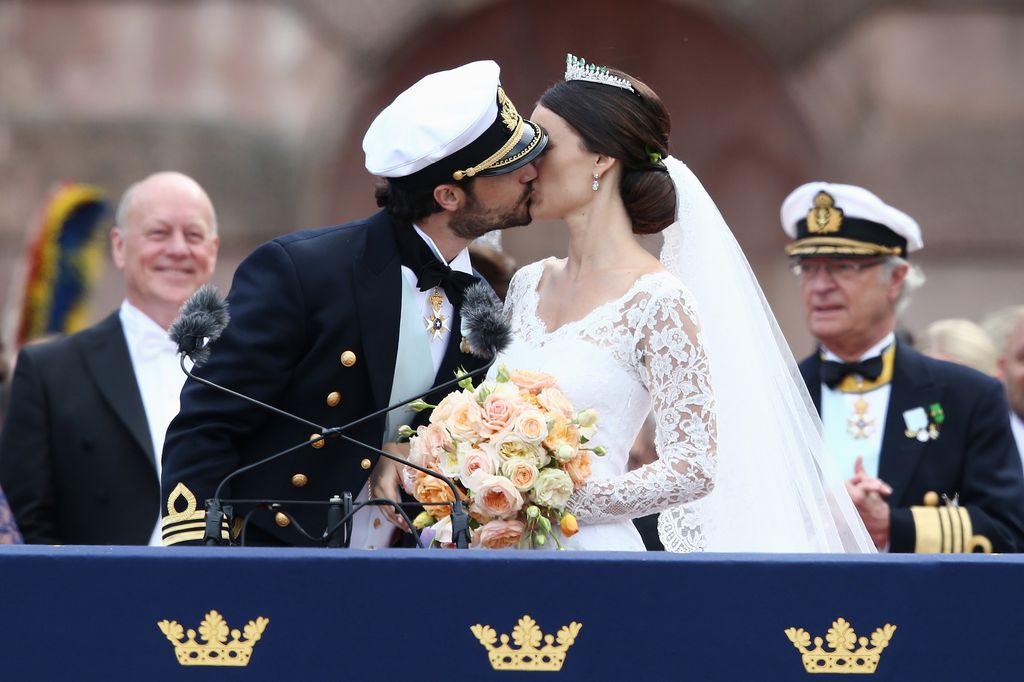 STOCKHOLM, SWEDEN - JUNE 13:  Prince Carl Philip of Sweden kisses Princess Sofia, Duchess of Varmlands after their marriage ceremony on June 13, 2015 in Stockholm, Sweden.  (Photo by Andreas Rentz/Getty Images)