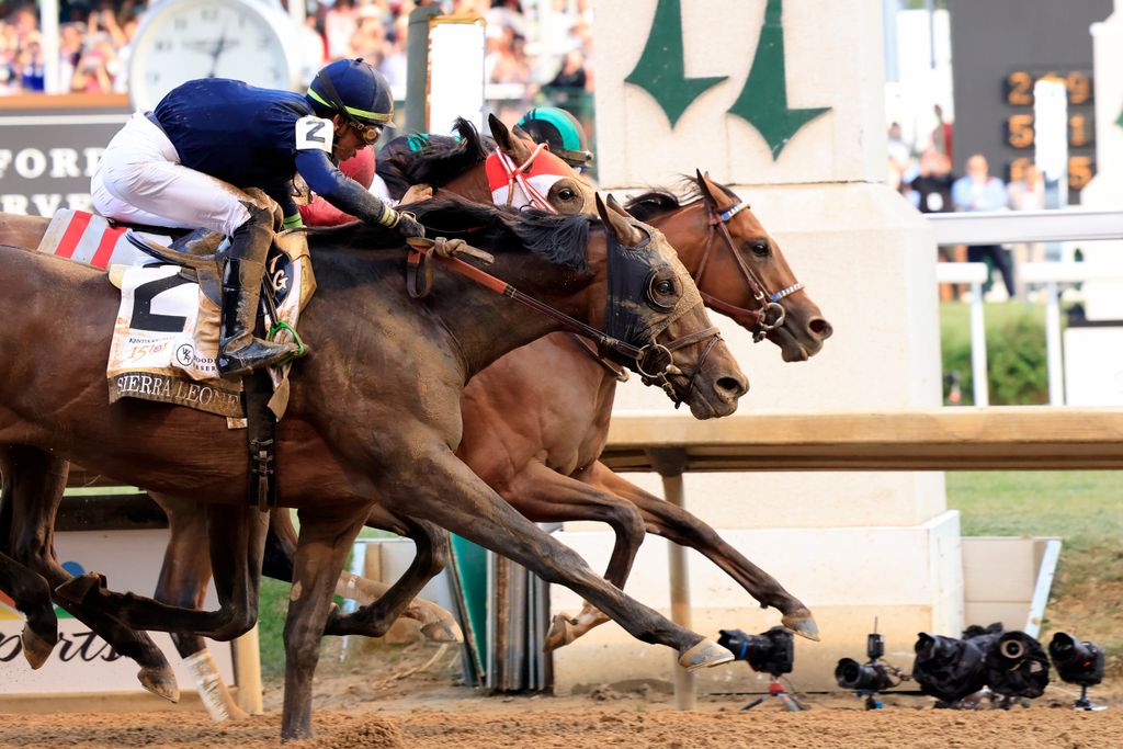 Mystik Dan #3, ridden by jockey Brian J. Hernandez Jr. crosses the finish line to win the 150th running of the Kentucky Derby 