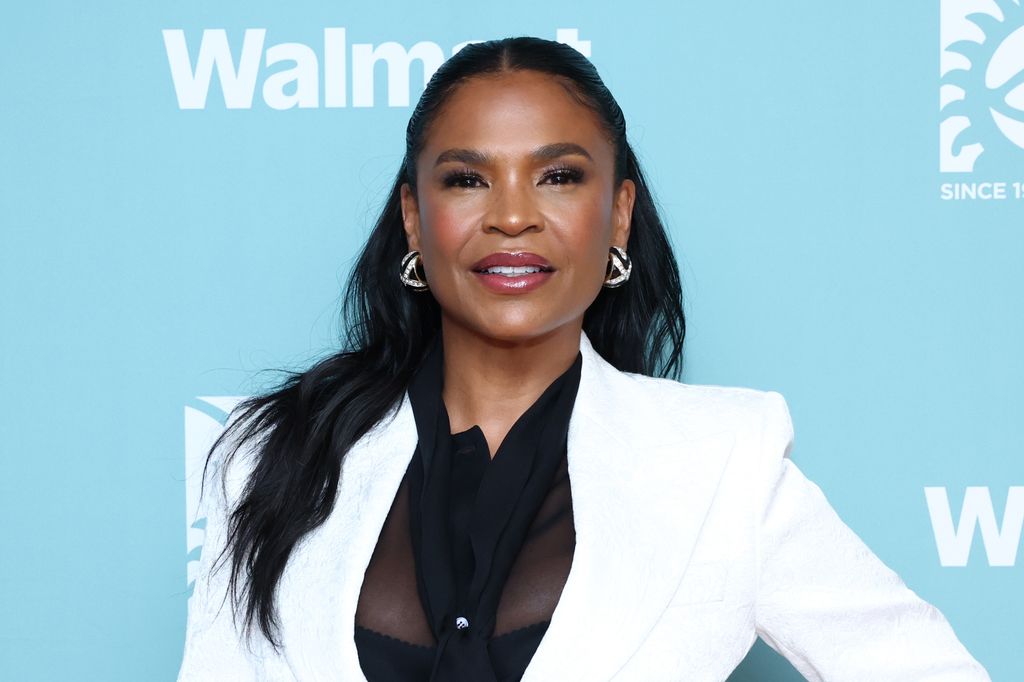 nia long white suit smiling
