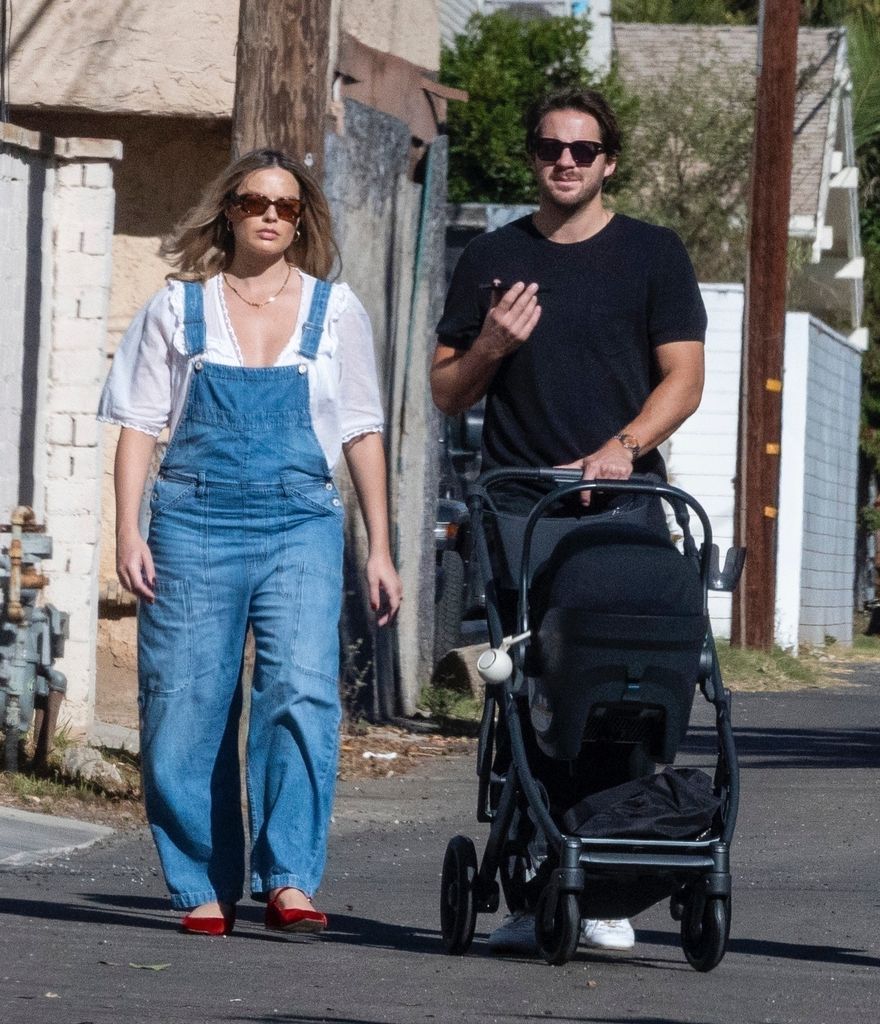 Margot and her husband were pictured out and about