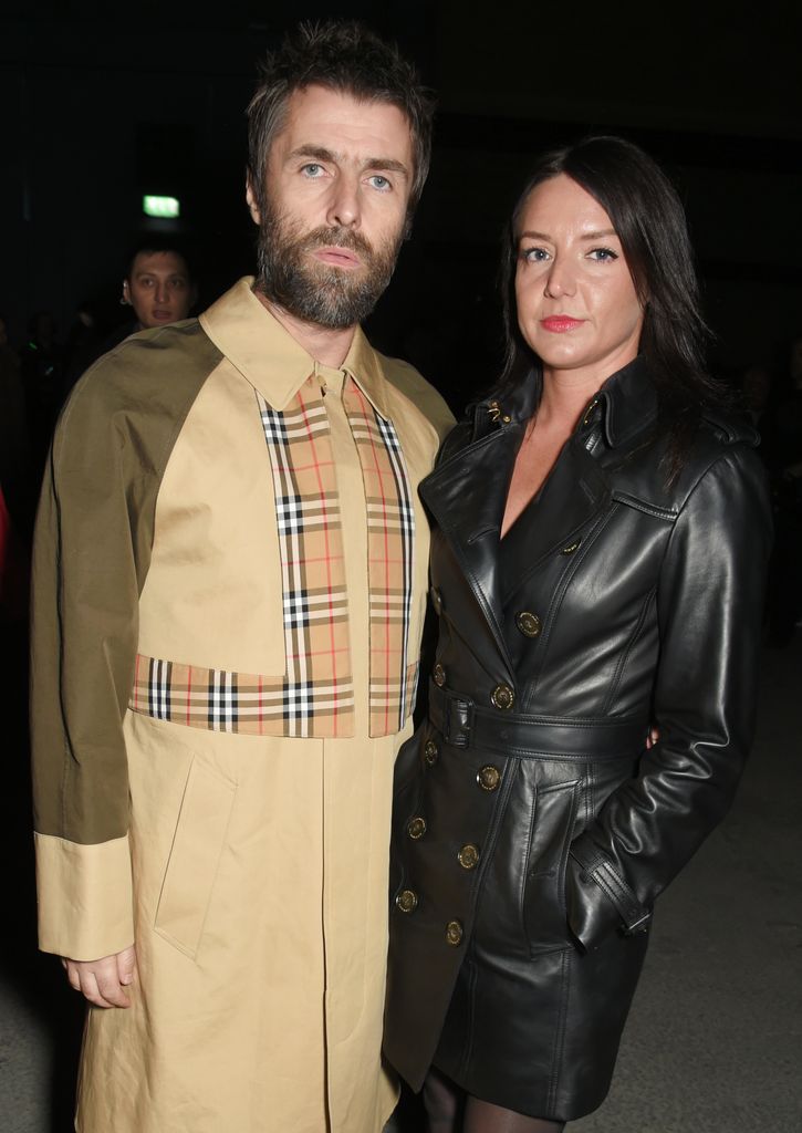 Liam Gallagher and Debbie Gwyther at a Burberry show