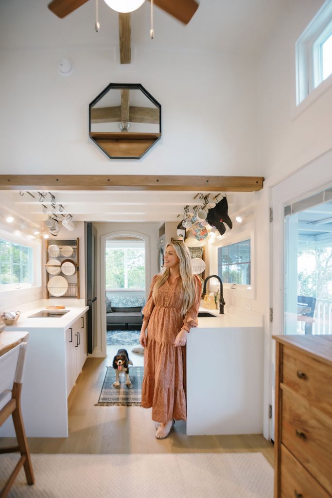 Crystal Hefner in her kitchen with her dog in Hawaii