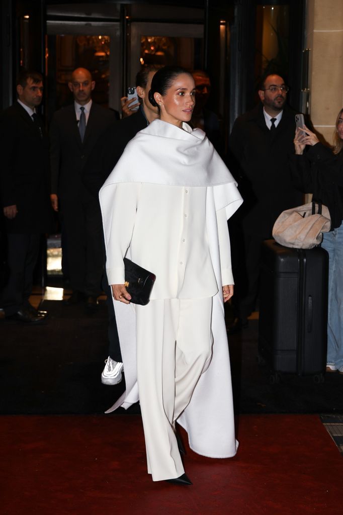BGUK_3375105 - Paris, FRANCE  Meghan Markle was seen leaving her hotel on her way to the Balenciaga show during Paris Fashion Week