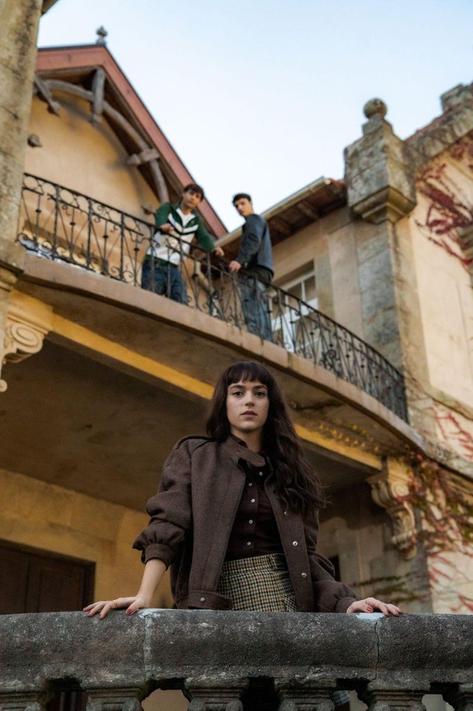woman standing on balcony