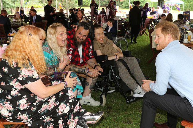 prince harry speaks with families wellchild