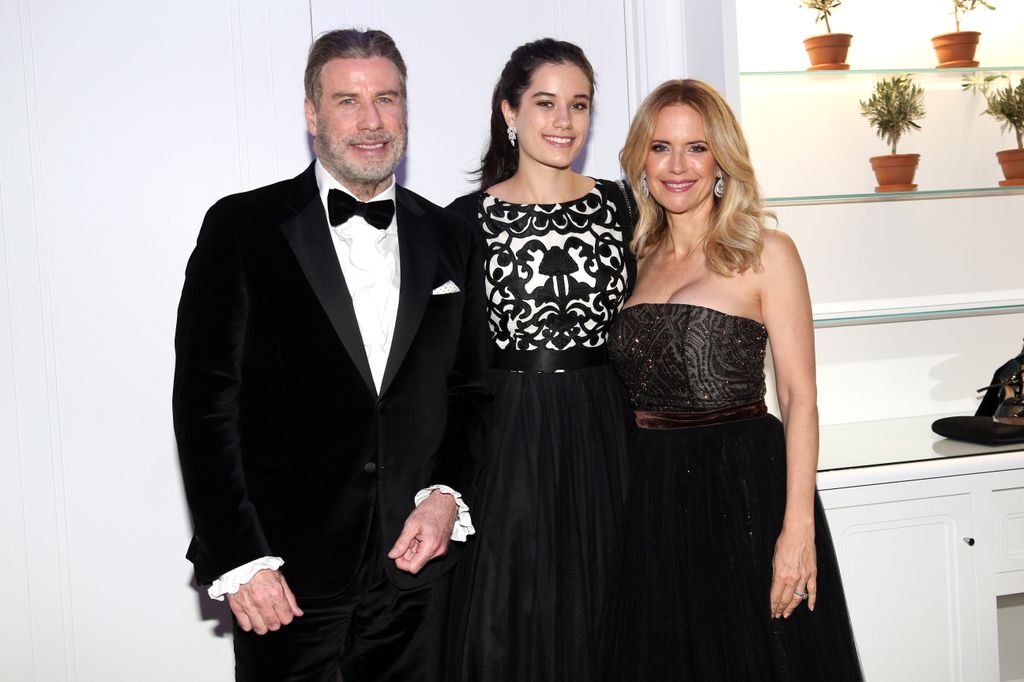 John Travolta and his wife Kelly Preston and daughter Ella Bleu Travolta (C) during the party in Honour of John Travolta's receipt of the Inaugural Variety Cinema Icon Award during the 71st annual Cannes Film Festival at Hotel du Cap-Eden-Roc on May 15, 2018