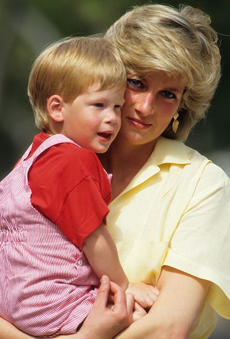 Princess Diana holding Harry