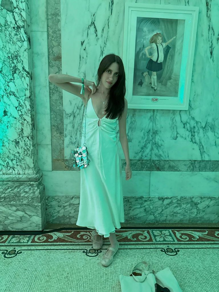 photo of mathilda gianopoulos in white dress