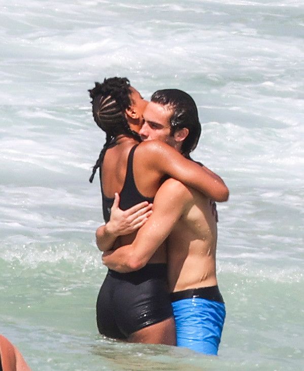 Willow Smith sparks romance rumors with love-interest Aussie singer/songwriter Eddie Benjamin, with the pair spotted in a PDA on a beach outing in Australia