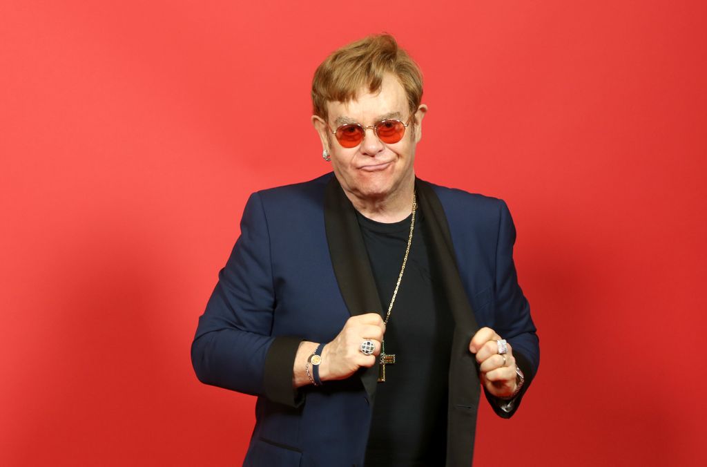 Elton posing at the 2021 iHeartRadio Music Awards