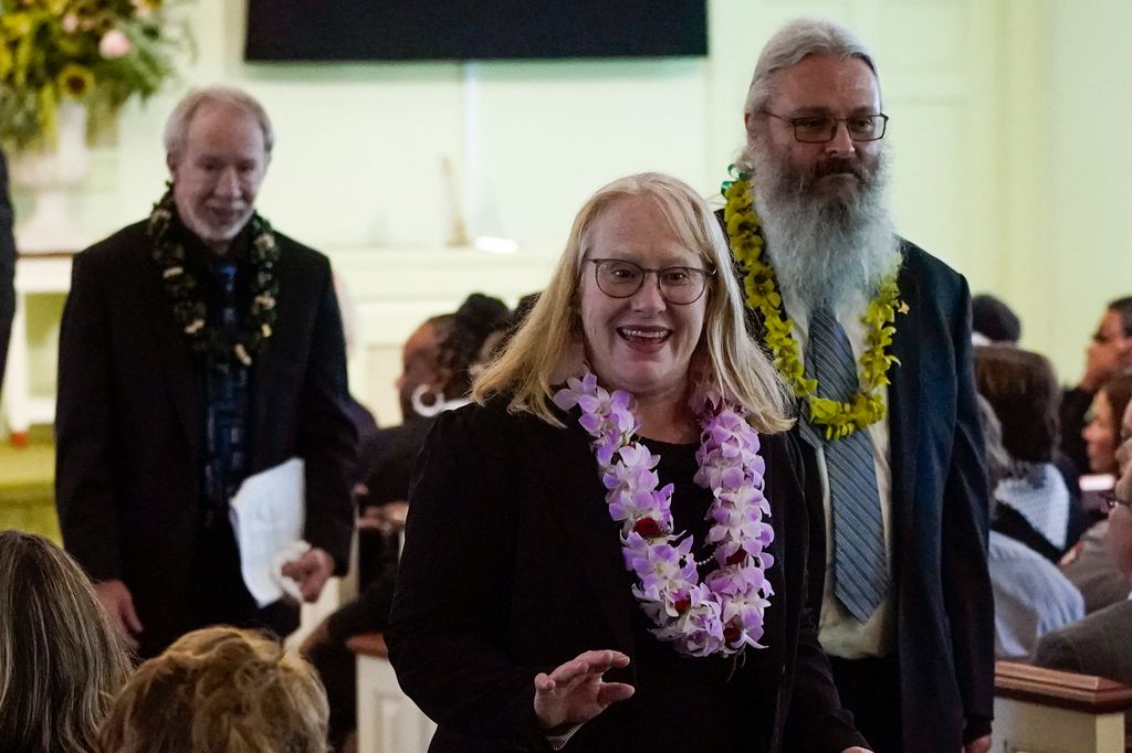 Amy Carter, daughter of former US president Jimmy Carter, and her husband John Joseph "Jay" Kelly depart after the funeral service for former first lady Rosalynn Carter at Maranatha Baptist Church on November 29, 2023 in Plains, Georgia.