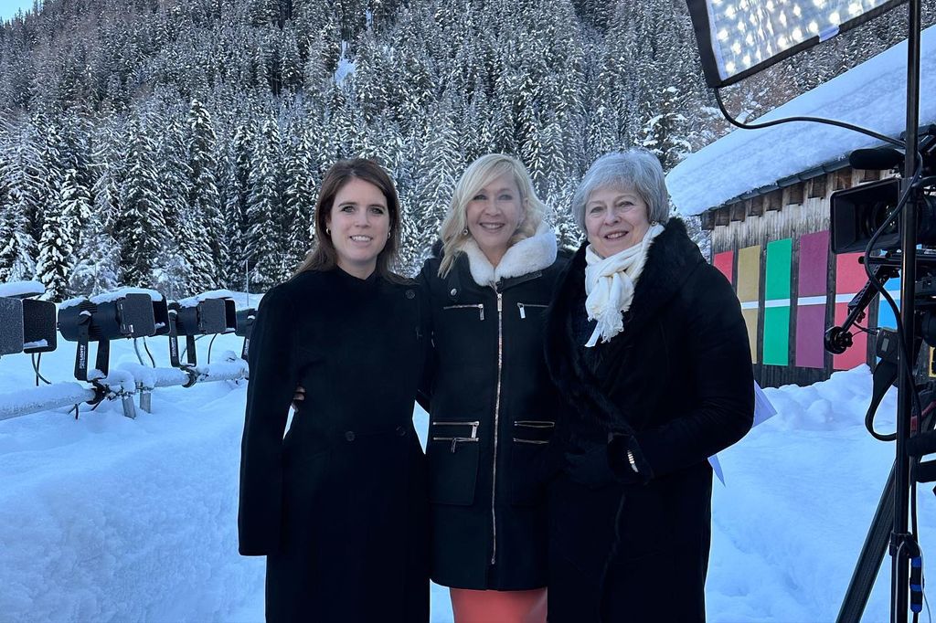 Princess Eugenie with Theresa May in the snow