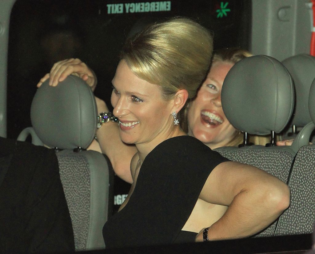 Zara Tindall in a car in a black dress with beehive hair