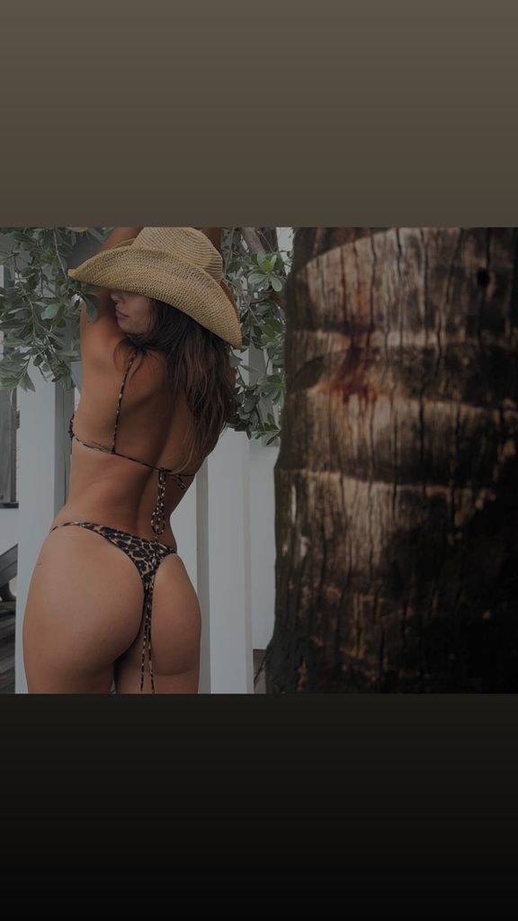 Hailey Bieber swimsuit photo sun hat